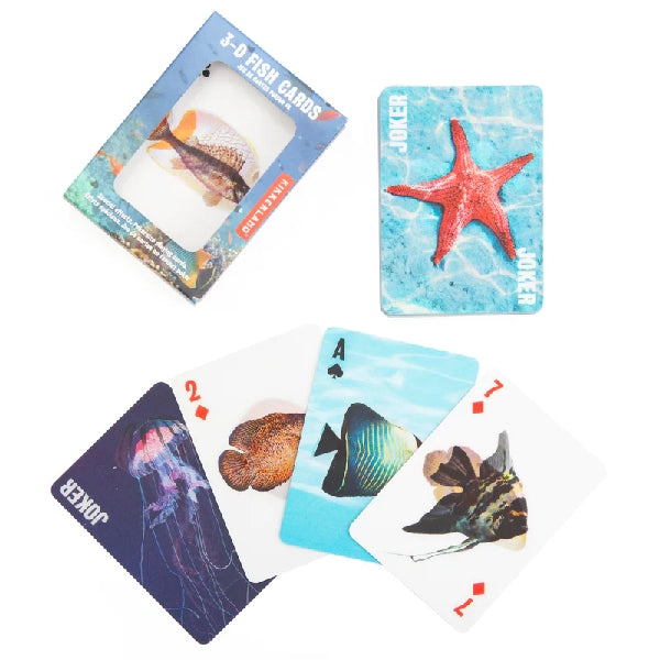playing card package and 5 cards onto a white background. package has a picture of fish in the ocean. it also has a window revealing a fish on a card. playing cards shown each have their own marine life image. kikkerland product. 