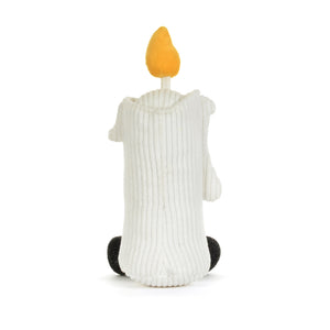 Back view of a white corduroy candle plush toy with a yellow-orange flame on top. It is shown on a white background. 
