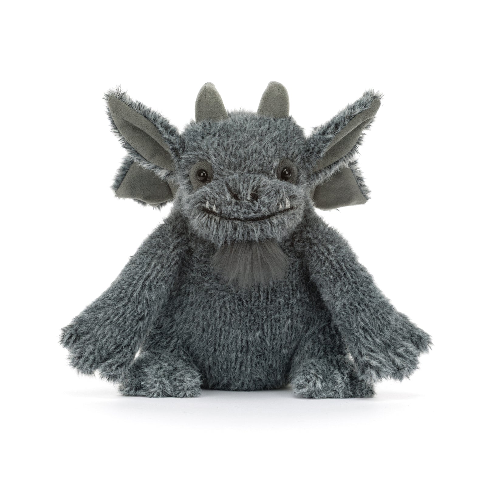 A gray plush gargoyle toy with large pointed ears, fangs, small horns, and a stitched smiling face with a gray beard. The plush is shown against a white background.