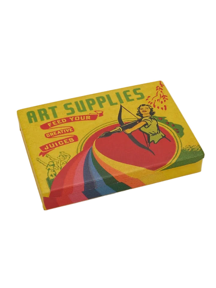 Image of a colourful pocket-sized storage tin featuring an illustration of a woman holding a bow and arrow. Rainbow colours are shown erupting from the tip of the arrow. The text 'Art Supplies' and 'Feed your creative juices' is printed over the image. The tin sits on a white background.