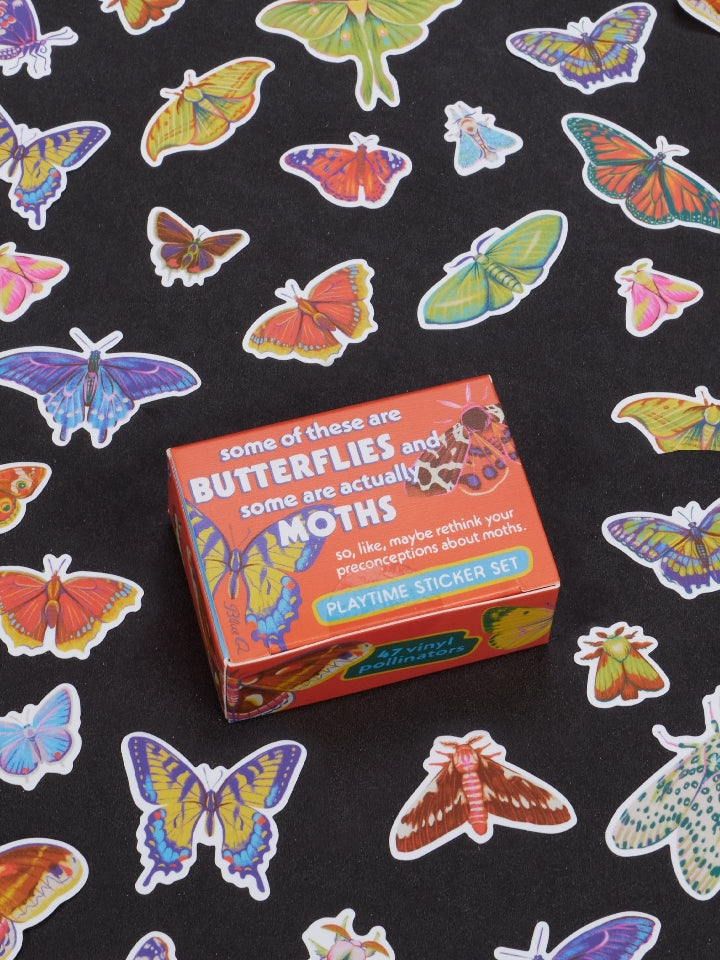 Image showing a packaging box for a Butterfly and Moth themed sticker set. Stickers of colourful butterflies and moths surround the box. The box and stickers sit against a black surface.