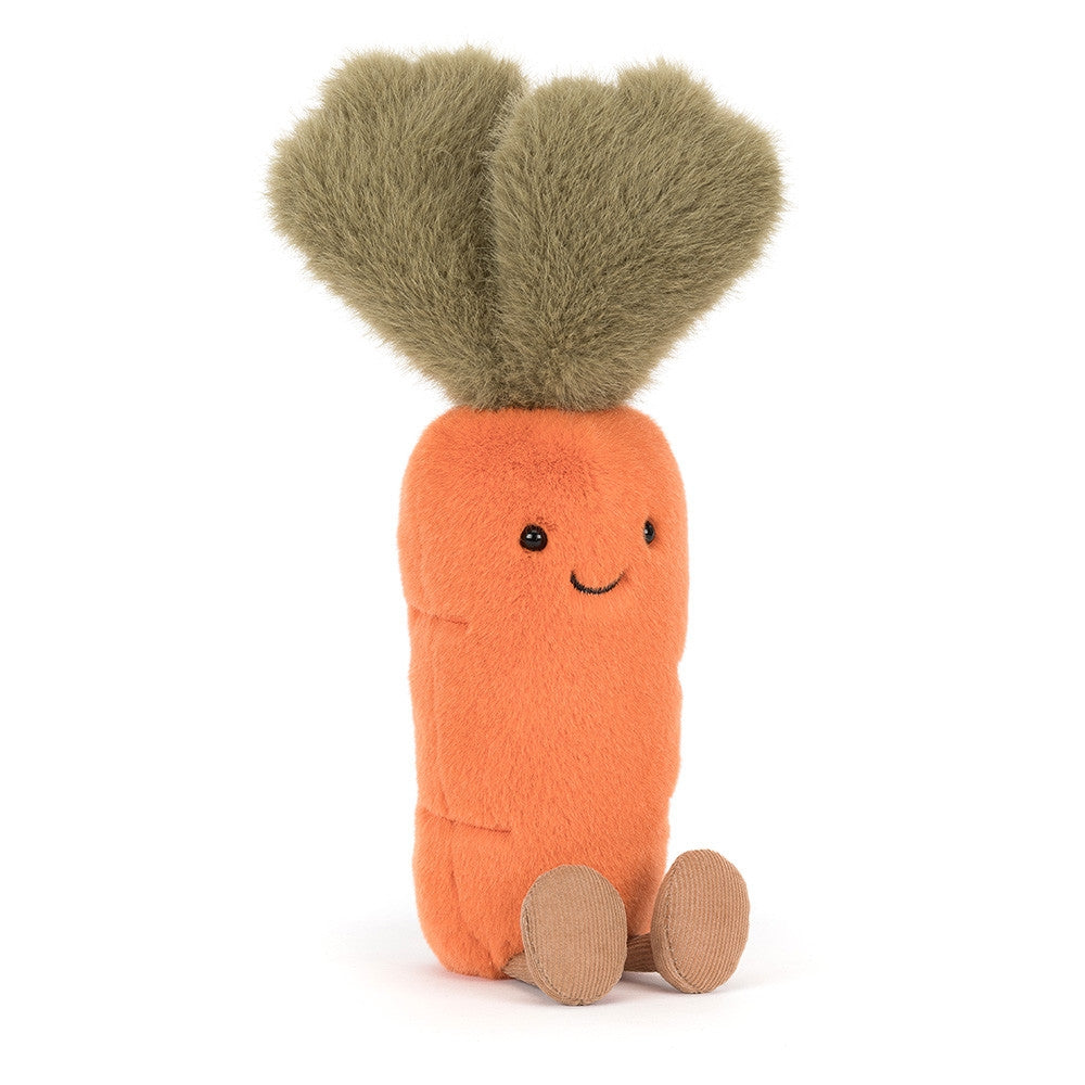 Front view of a Jellycat orange carrot shaped plush with a smiling face, green stems and brown feet on a white background.