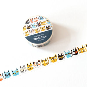 Colorful washi tape with cat designs on a white background.