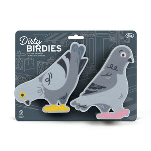 Image of two pigeon-themed kitchen sponges attached to their packaging which is blue with street illustrations in the background. The text 'Dirty Birdies', along with the company branding is also shown. 