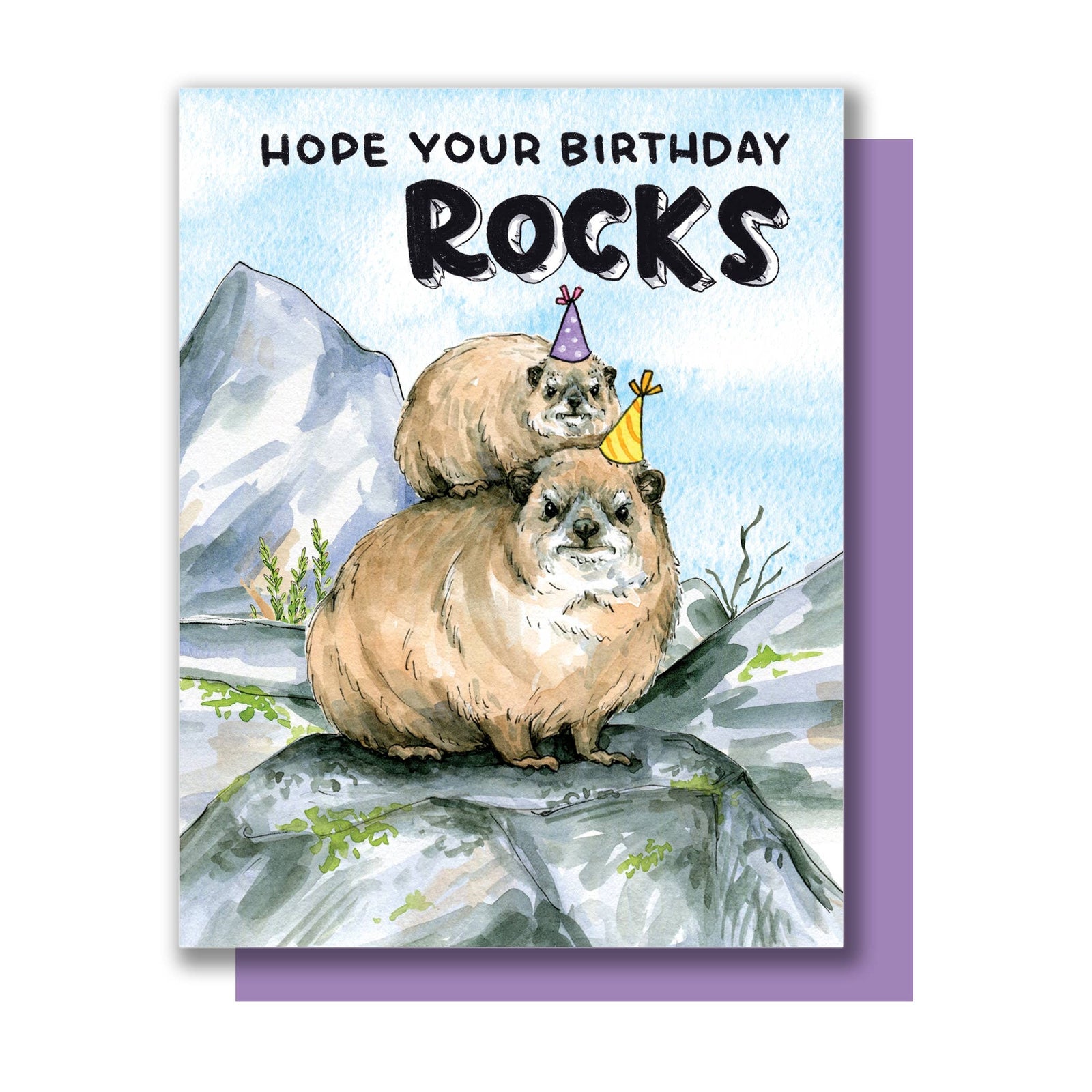 Greeting card with two rock hyraxes wearing party hats on a mountain, with the text 'Hope your birthday rocks'.