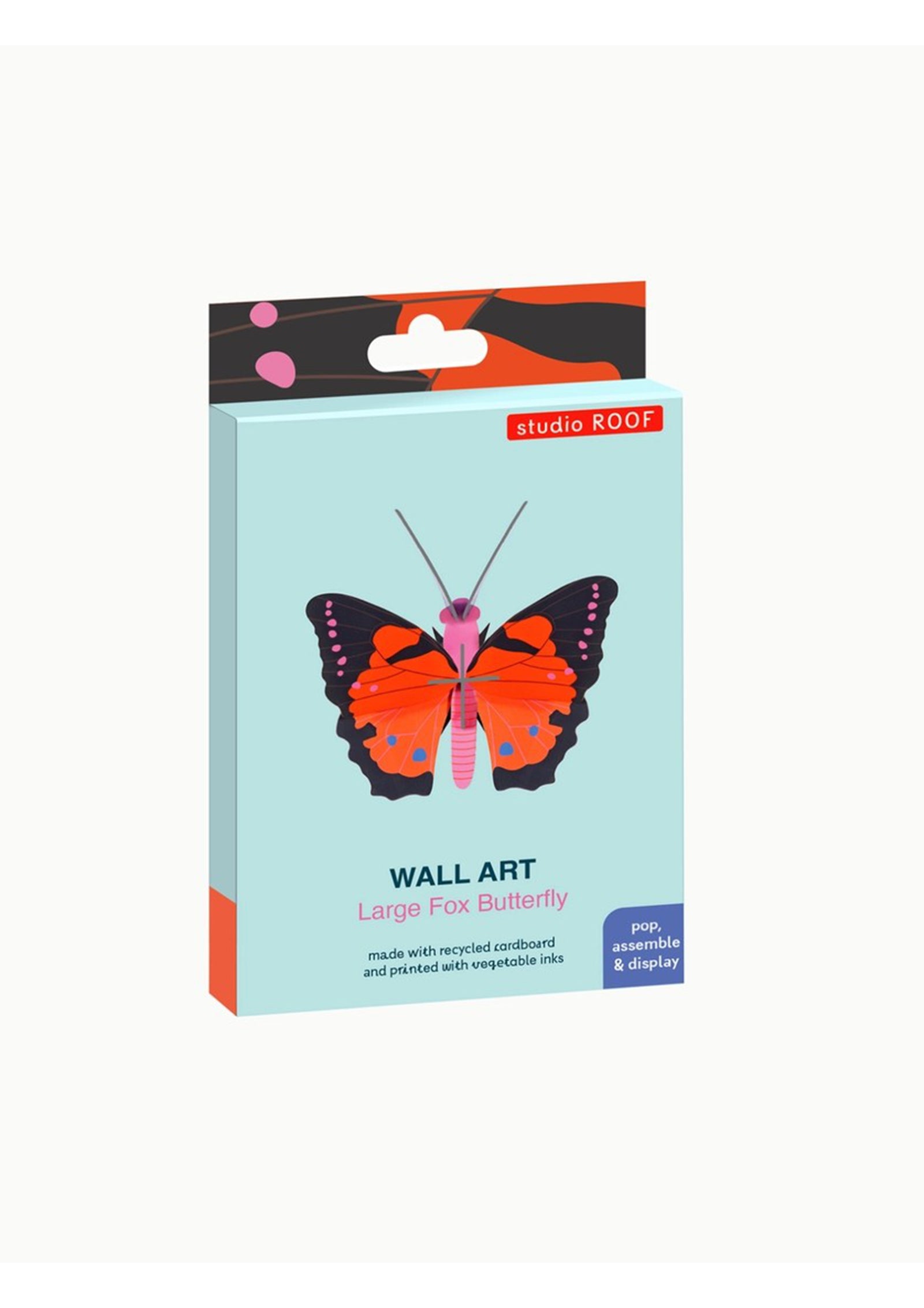 Packaging box for a large fox butterfly wall art kit from Studio Roof. The box features an image of a red, black and pink 3D butterfly on a blue background. 