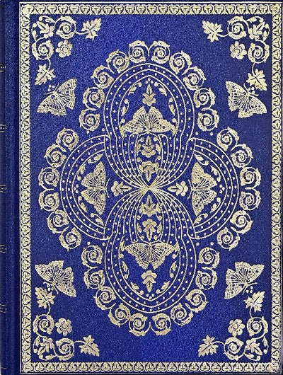 shiny indigo journal with intricate gold details that include butterflies and swirls