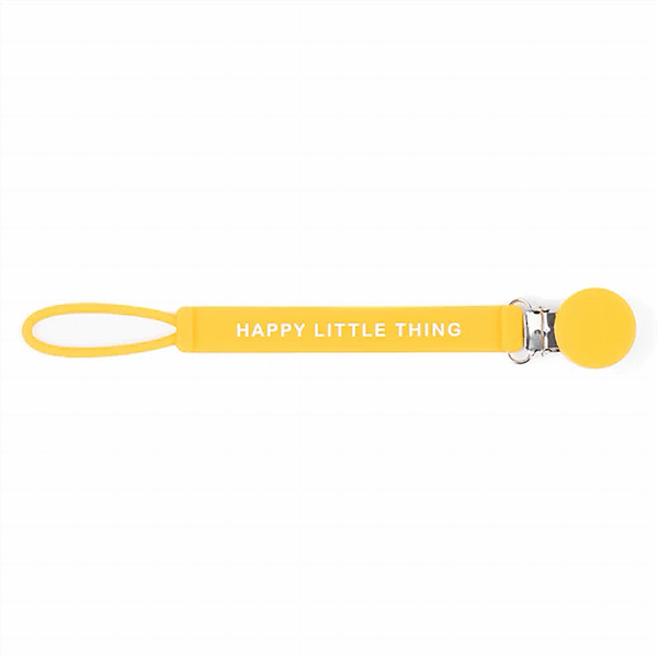 bella tunno bright yellow pacifier clip. a band with the text "happy little thing" have a loop on one end and a clip on the other. 