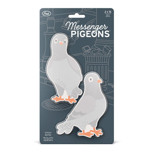 Image of two pigeon-themed sticky note pads in blue packaging with some illustrations of a street with a trash can and car. The product is shown on a white background.
