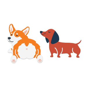 Image of two dog-shaped bookmarks on a white background. One is an orange and white corgi, while the other is a brown and black dachshund.