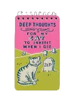 A spiral-bound notebook with a pink and green cover featuring an illustration of a striped cat sitting in a graveyard. The text 'Deep Thoughts For My Cat To Inherit When I Die' is printed at the top. 