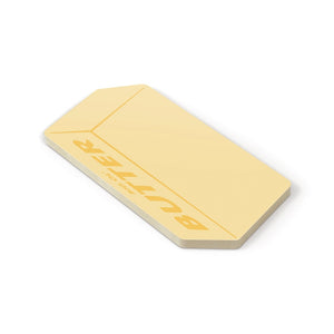 Image of a pack of yellow sticky notes in the shape of a bar of butter on a white surface. The text 'Big 'ol butter' is printed across the sticky notes.