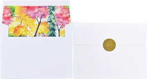 Two white envelopes shown side by side; one is open and shows a tree printed interior, the other is closed and sealed with a gold circular sticker. 