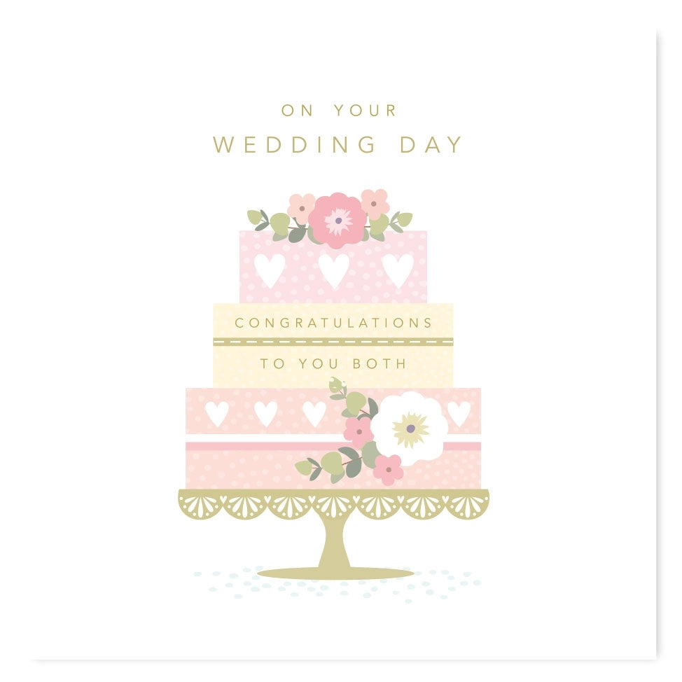 Greeting card featuring an illustration of a 3-tiered wedding cake with floral and heart decorations on a white background. The text 'On your wedding day' and 'Congratulations to you both' is printed on the card too. 