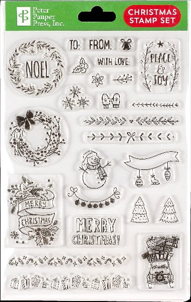 clear sheet package with a green hanging cardboard piece. visible in the packaging are various clear christmas stamps like text samples, wreaths, trees, and more